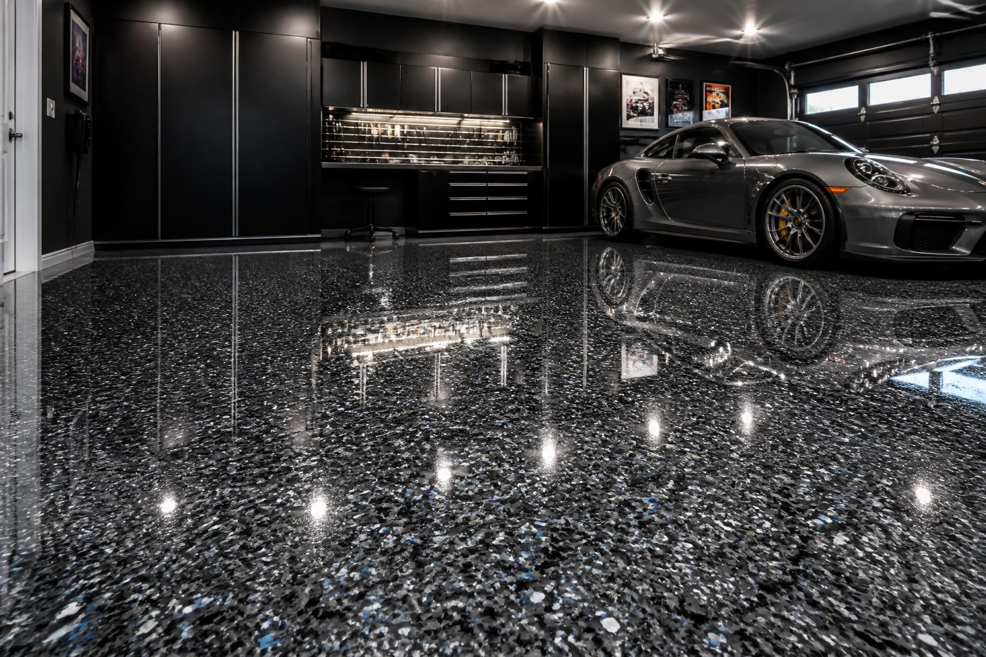 Glossy silver and charcoal flake epoxy garage floor installed in Connecticut