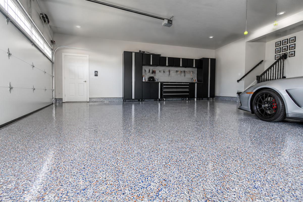 Gray and black full flake epoxy garage floor with a high gloss topcoat in Connecticut